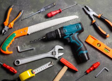 Various repair tools, hardware materials, drill, hammer, pliers, screwdriver, wrench